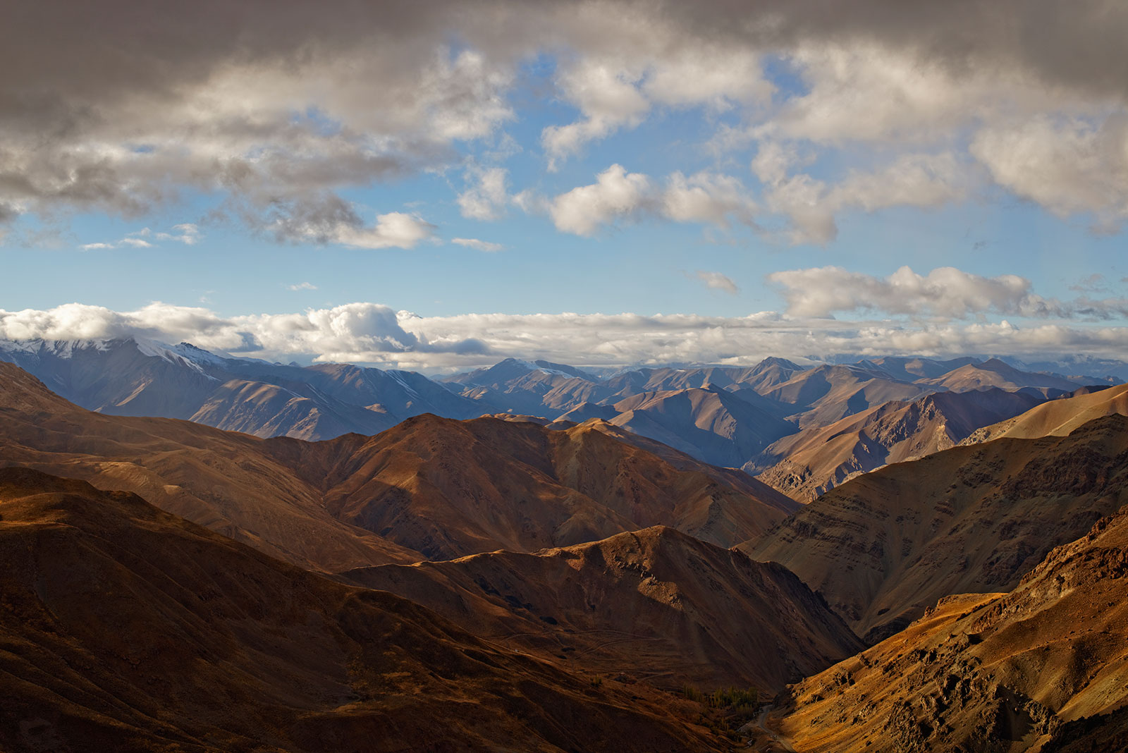 Landscape of high peaks covered by clouds and snow at central region of Alborz mountain. Tokina opera 50mm F1.4 FF at f/4 on Nikon D610 at ISO50, Dizin Ski resort, Iran.