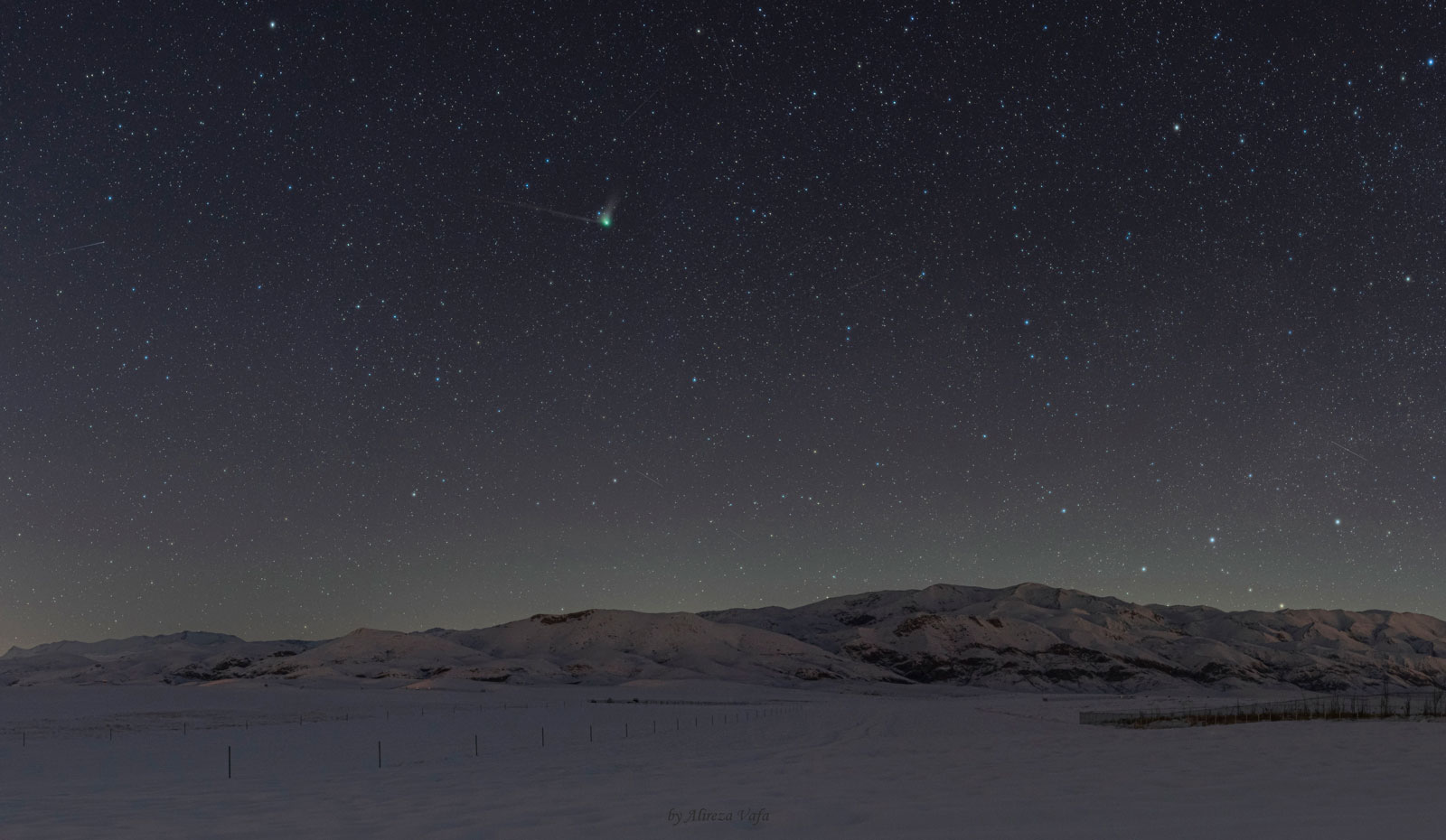 On February 2nd 2023 comet C/2022 E3 (ZTF) was at its closest approach to us. The comet resembled a colorless faint ball seen with the naked eye but it shows its structures beautifully to the camera. Two fast lenses utilized to capture this image: one of which is Tokina opera 50mm F1.4 FF on Nikon D610 body was used to capture the entire sky and foreground on a panoramic view attached on the Kenko SKYMEMO S star tracker for comet details. 